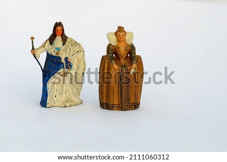 Lead soldiers. King and Queen Royalty-Free Stock Photo #2111060312