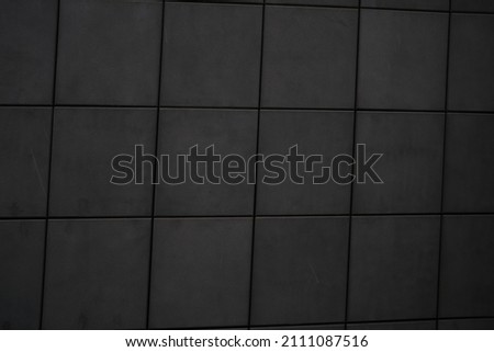 Vintage dark gray brick background, Abstract geometric pattern texture, Outdoor building block wall, Dark