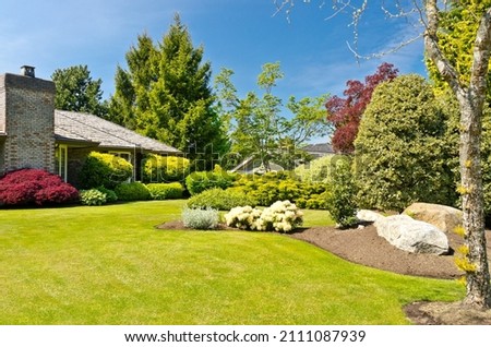 Outdoor landscape garden in North Vancouver, British Columbia, Canada. Royalty-Free Stock Photo #2111087939