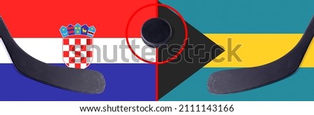 Top view hockey puck with Croatia vs. Bahamas command with the sticks on the flag. Concept hockey competitions