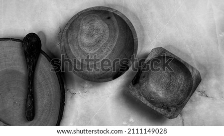 Black and white, Wooden kitchenware that gives a classic and minimalist impression. Food and drink concept. Food Photography. Flat Lay, Wooden Bowl on the table.