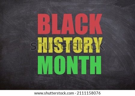 Black history month text with a black background. Black history month. Royalty-Free Stock Photo #2111158076