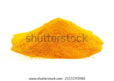 Heap of turmeric powder isolated on white background, close-up. Yellow turmeric powder. Indian spice, turmeric powder isolated on white background. Turmeric powder isolated on white background, macro. Royalty-Free Stock Photo #2111193980