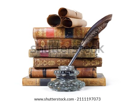 Stack of antique books, inkwell with quill pen and old scrolls, on white background  Royalty-Free Stock Photo #2111197073