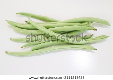 greenbeans isolated on white background. greenbeans are a type of legume. Fruit, seeds, and leaves are used by people as a vegetable. This vegetable is rich in protein
