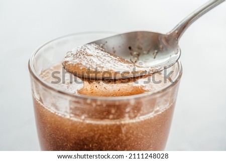 A glass of water soluble psyllium husk dietary fiber supplement, healthy diet morning routine Royalty-Free Stock Photo #2111248028