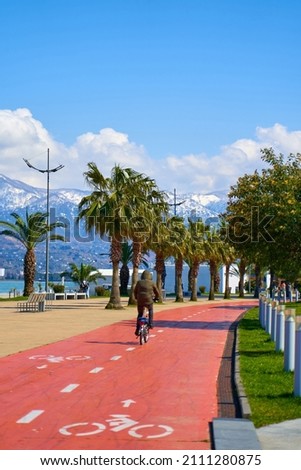 Cycle path across the entire embankment by the sea. The resort town of Batumi.