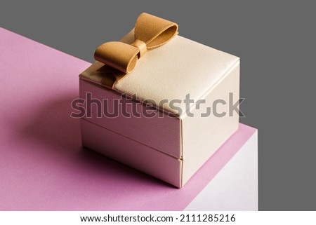 Present box on the gray background