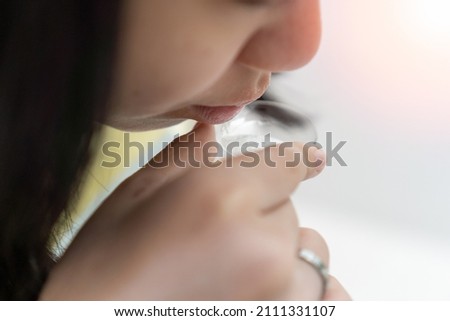 ATK Antigen test kit for COVID-19 saliva SARS CoV coronavirus at home. Kid student spit saliva for testing before back to school. People healthcare concept. Royalty-Free Stock Photo #2111331107