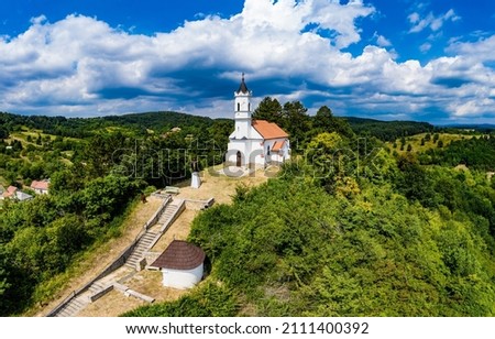 Drone panorama photo of church on hill. Magyarpolany, Hungary