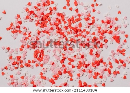 Many multicolored sugar hearts on a white background. Valentine's day concept.
