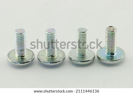 Metal bolts close-up on a white background.