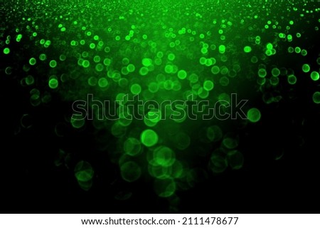 Fancy emerald green black glitter sparkle background for confetti happy birthday party invite, St Patrick’s Day sale, lucky Saint Patty Irish kid children texture, glam Christmas or wedding pattern  Royalty-Free Stock Photo #2111478677