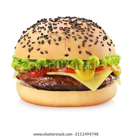 Cheeseburger with beef patty, pickles, cheese, tomato, onion, lettuce, ketchup and mustard isolated on white background.