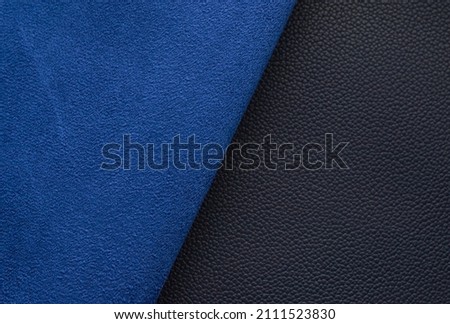 blue artificial leather with waves and folds on PVC base Royalty-Free Stock Photo #2111523830