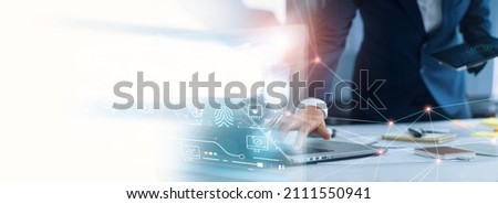 Businessman connect to global network and create a new approach to investment project and develop software to improve business service. Communication networking and worldwide connection technology. Royalty-Free Stock Photo #2111550941