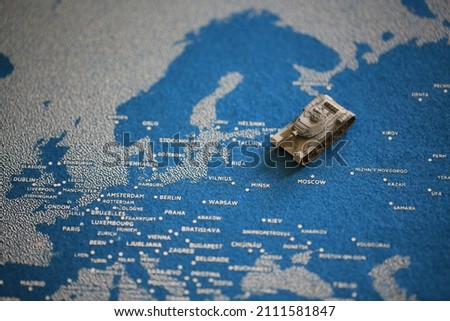 the tank model and map on Europe, Russia-Ukrainian boundary Royalty-Free Stock Photo #2111581847