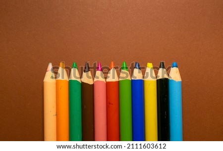 Pictures of pencils on different background. 