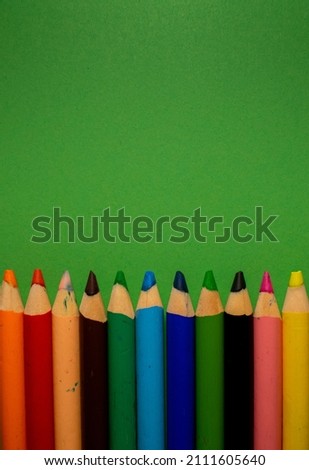 Pencils photographed on different backgrounds. 