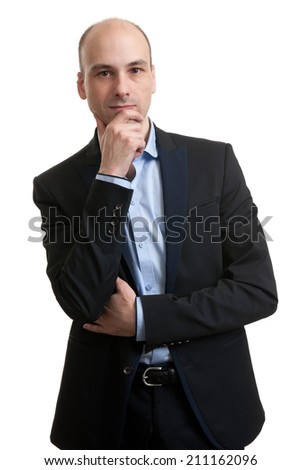Businessman thinking with hand on chin. Isolated over white