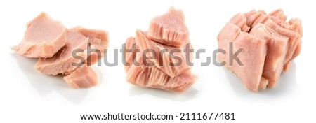 Tuna fish isolated. Canned tuna pieces. Tuna can on white background. Collection. Royalty-Free Stock Photo #2111677481