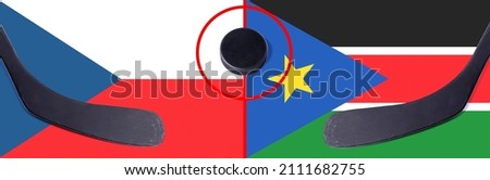 Top view hockey puck with Czech Republic vs. South Sudan command with the sticks on the flag. Concept hockey competitions