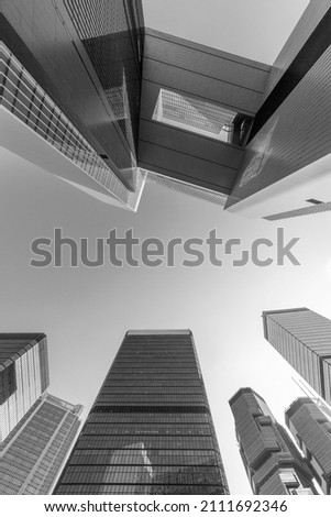 Exterior of modern office building in downtown district of Hong Kong city. Architecture abstract background