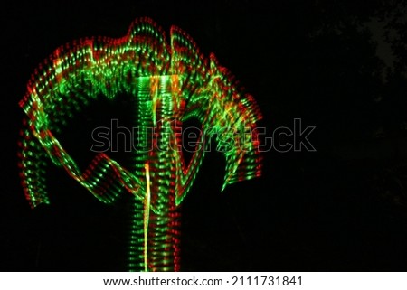 Beautiful Light Painting Photography nigh time Royalty-Free Stock Photo #2111731841