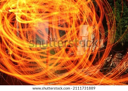 Beautiful Light Painting Photography nigh time Royalty-Free Stock Photo #2111731889