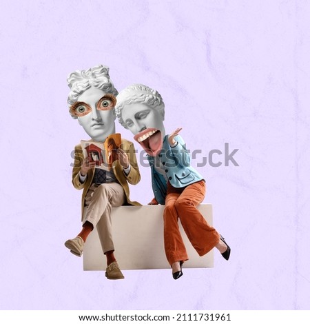 Shock news. Stylish surprised couple headed with ancient statue heads reading magazine on light background. Contemporary art collage. Inspiration, idea, trendy magazine style. Surrealism. Royalty-Free Stock Photo #2111731961