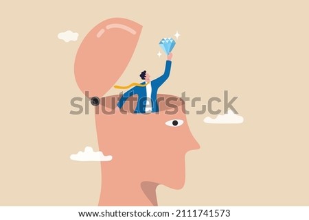 Self discovery, finding yourself searching for self value, success dream or meaning of life, exploration, inner or inside concept, happy businessman succeed finding valuable diamond inside his head. Royalty-Free Stock Photo #2111741573