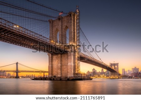 Sunrise at the Brooklyn bridge in New York with Manhattan Bridge in the background