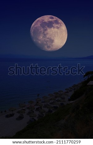 Super moon over the beach 