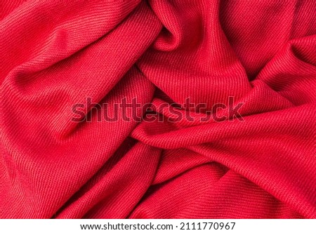 crumpled pink fabric texture background close up