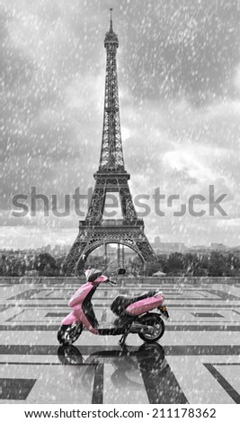 Eiffel tower view from the street of Paris. Black and white photo with colour element