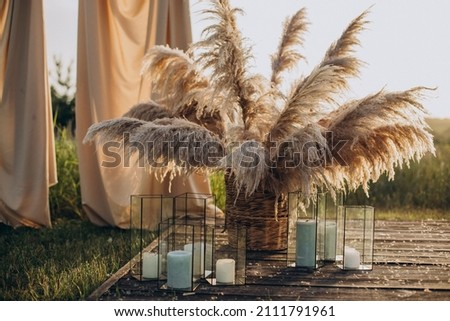 Wedding ceremoby decorations and elements in boho style