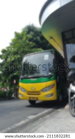Blurry and Defocused Trans Jogja BRT Royalty-Free Stock Photo #2111832281