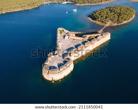 St. Nicholas Fortress (Croatian: Tvrđava sv. Nikole) is a fortress located at the entrance to St. Anthony Channel, near the town of Šibenik in central Dalmatia, Croatia Royalty-Free Stock Photo #2111850041