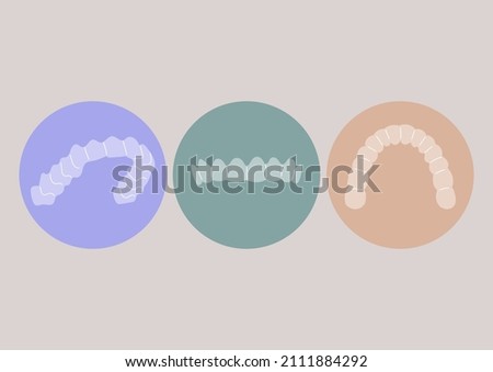 A set of plastic removable dental aligners, invisible braces technology, teeth straightening, whitening, and grinding protection Royalty-Free Stock Photo #2111884292
