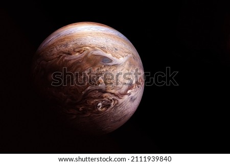 Planet Jupiter on a black background. Elements of this image furnished by NASA. High quality photo Royalty-Free Stock Photo #2111939840