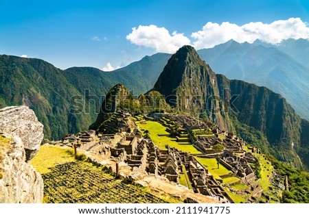 Ancient Incan city of Machu Picchu in Peru Royalty-Free Stock Photo #2111941775