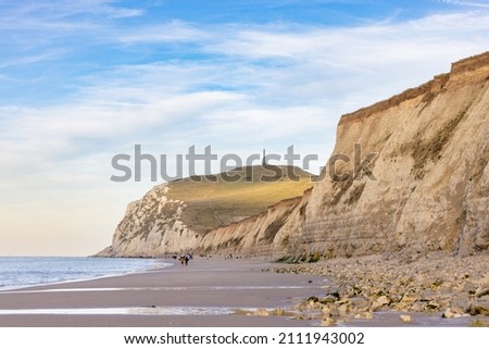 Seascape of the opal coast of Cap Blanc Nez, showing the Monument at Cape white Nose France on top of the chalk cliffs. High quality photo Royalty-Free Stock Photo #2111943002