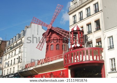 Moulin Rouge in Paris France Royalty-Free Stock Photo #2111981876