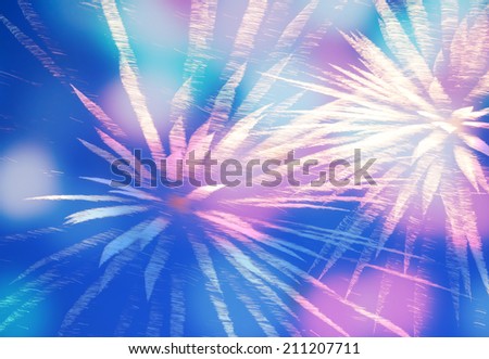 fireworks, blurred image. Christmas background. Light with glowing sparks, merry christmas greeting card 