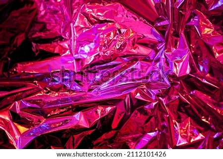 Brilliant photo foil background in different shades of pink