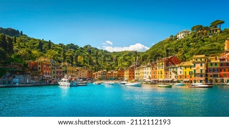 Portofino luxury travel destination. Village, yachts and boats in little marina. Liguria region, Italy Royalty-Free Stock Photo #2112112193