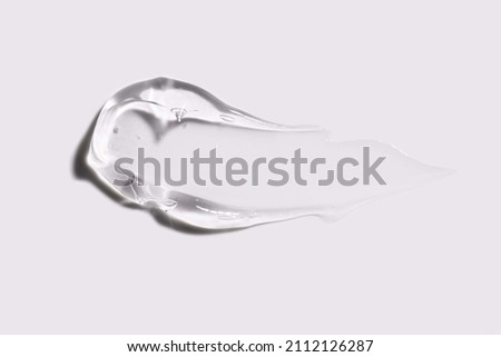 Liquid gel cosmetic smudge texture Royalty-Free Stock Photo #2112126287
