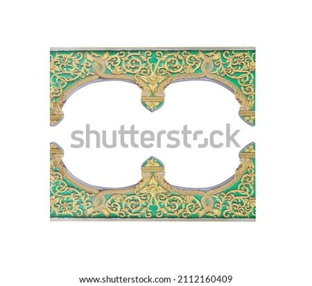 Gold engraving with flower and serpent patterns on wood frame  isolated on white background , clipping path