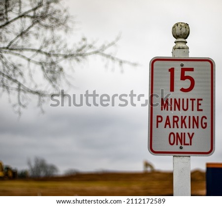 15 min parking only red and white outdoors 