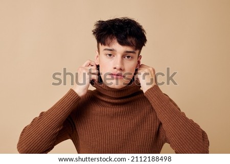 handsome guy fashionable clothes posing studio modern style isolated background unaltered
